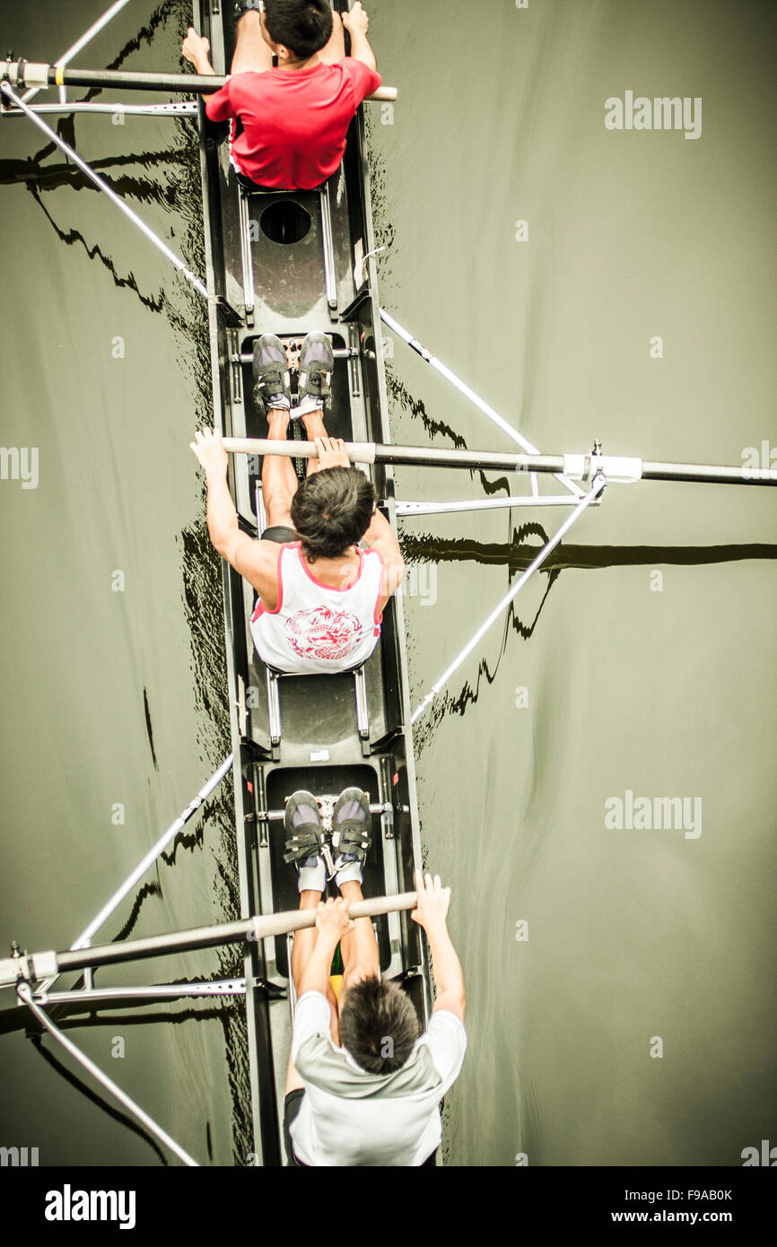 Overhead shot of rowers in a boat Stock Photo