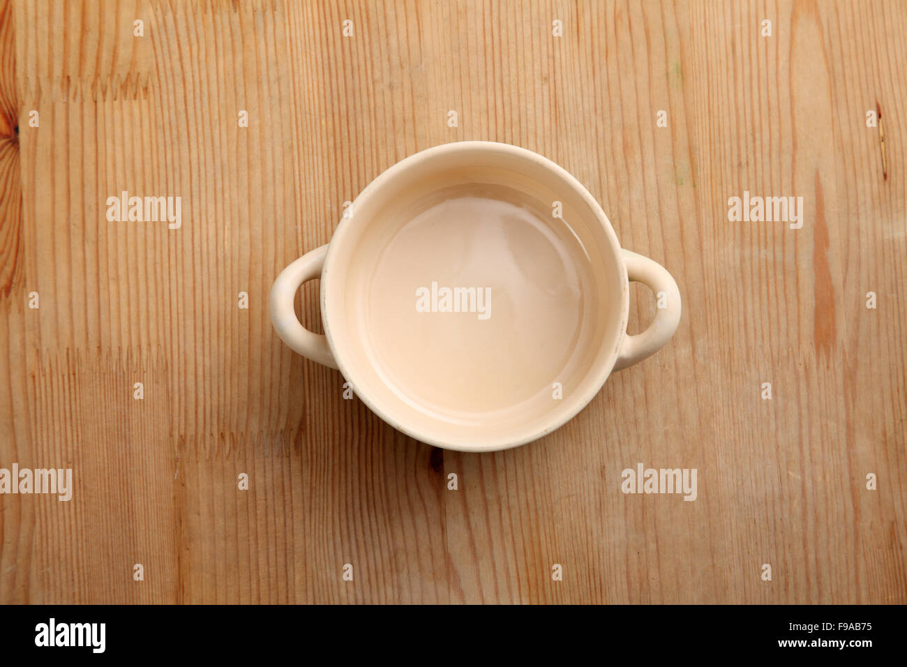 brown color soup bowl with handle Stock Photo