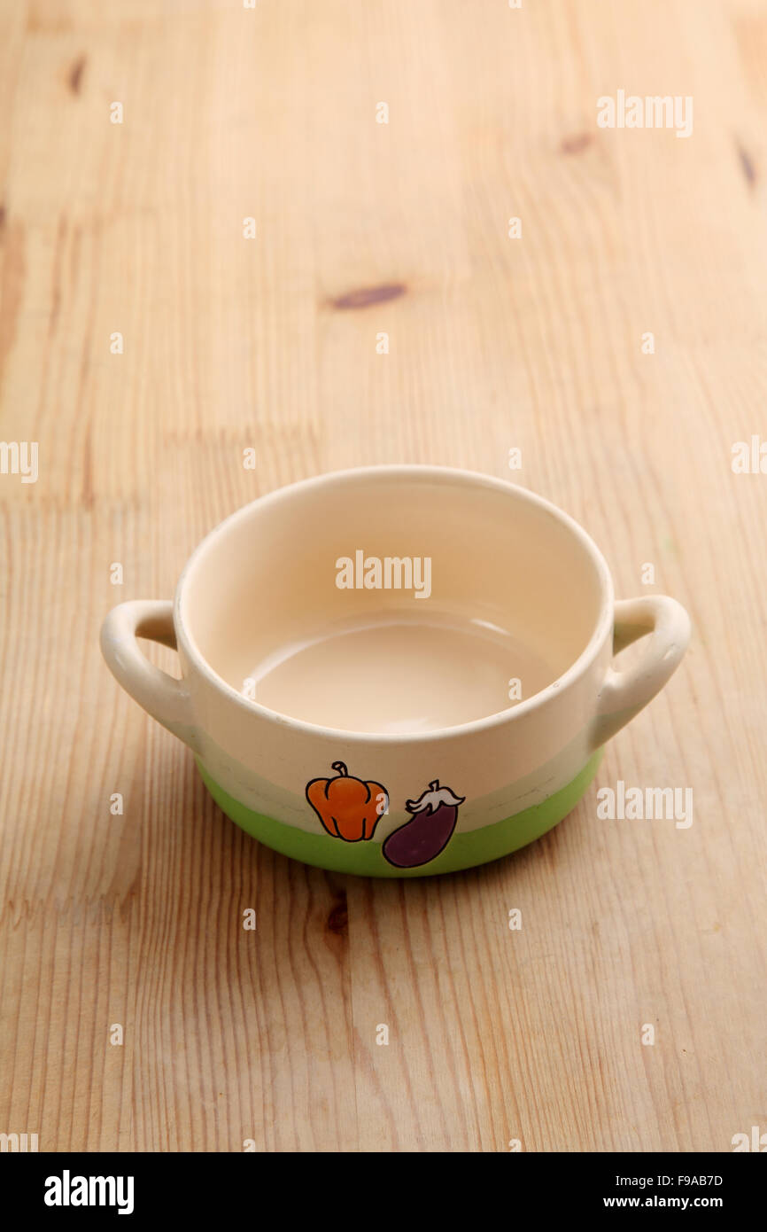 brown color soup bowl with handle Stock Photo