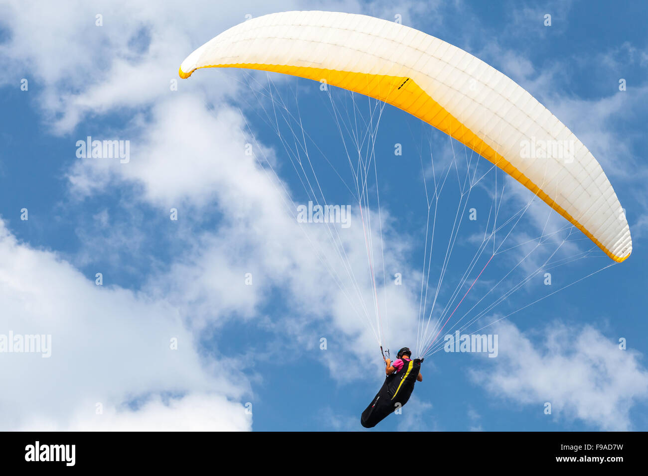Burgas, Bulgaria - July 23, 2014: Amateur paraglider in blue sky with clouds Stock Photo