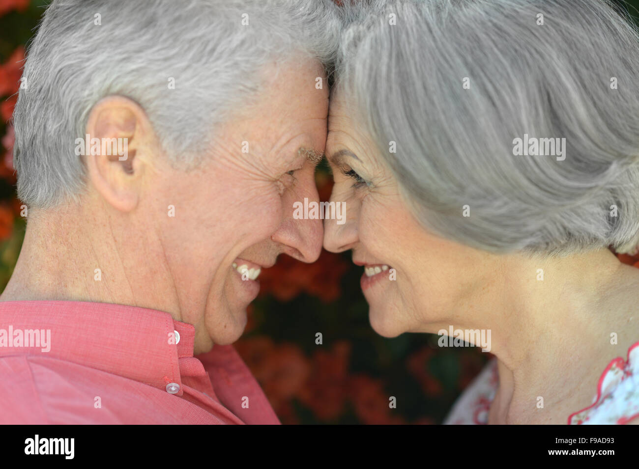 mature couple on  in summer park Stock Photo