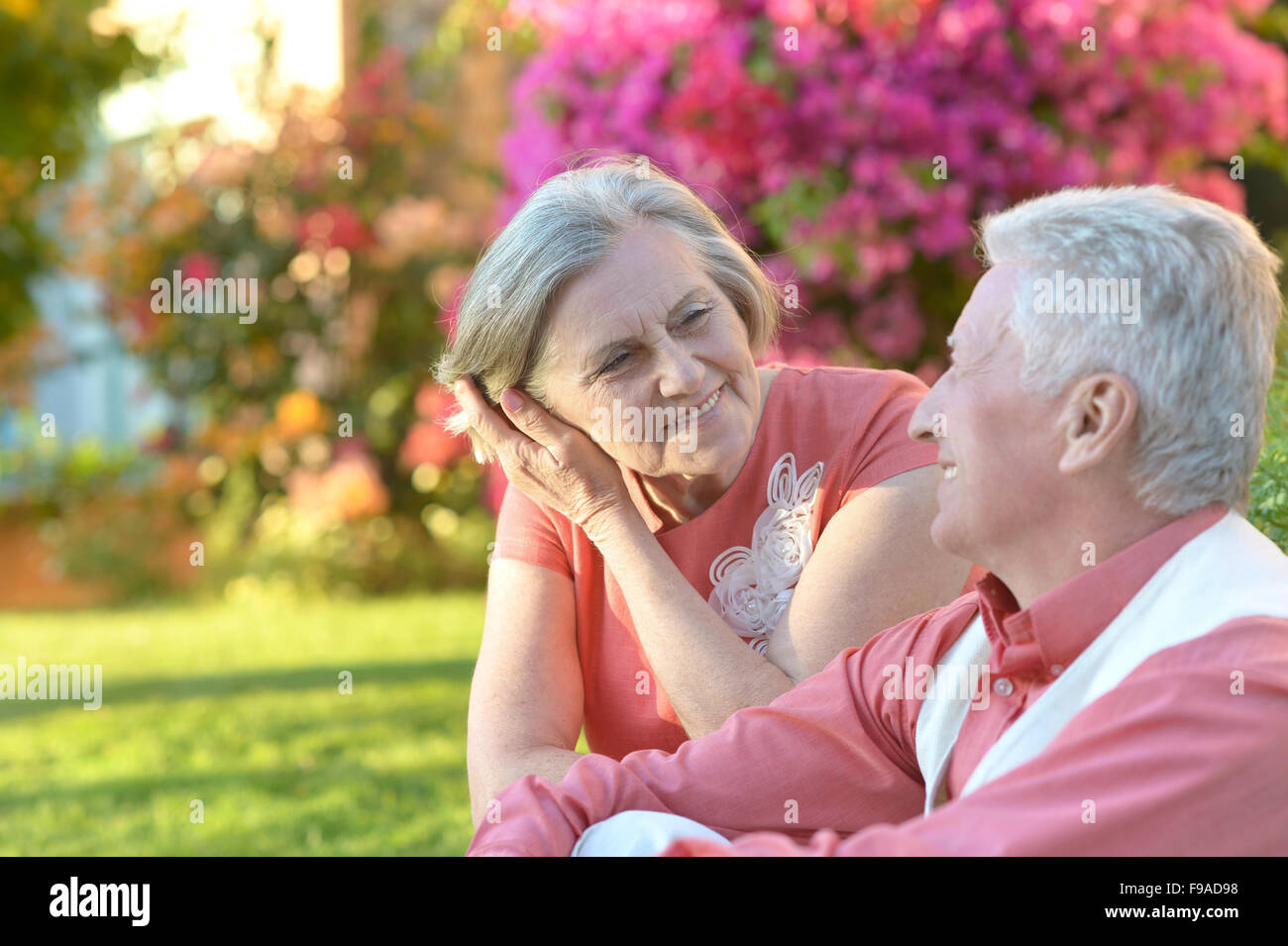 mature couple in a  summer park Stock Photo