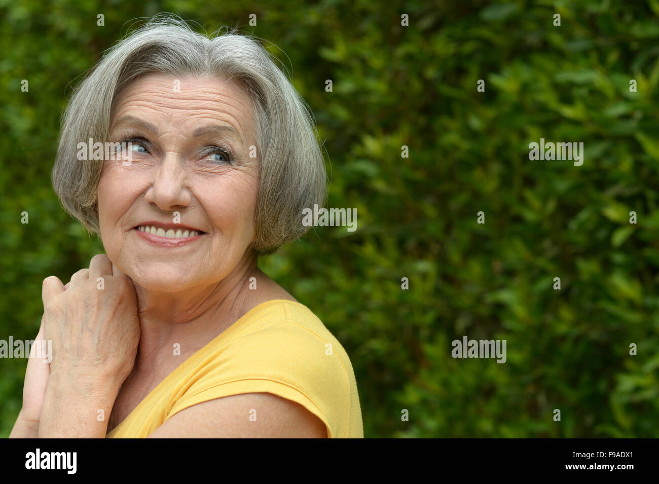 senior woman in summer park Stock Photo