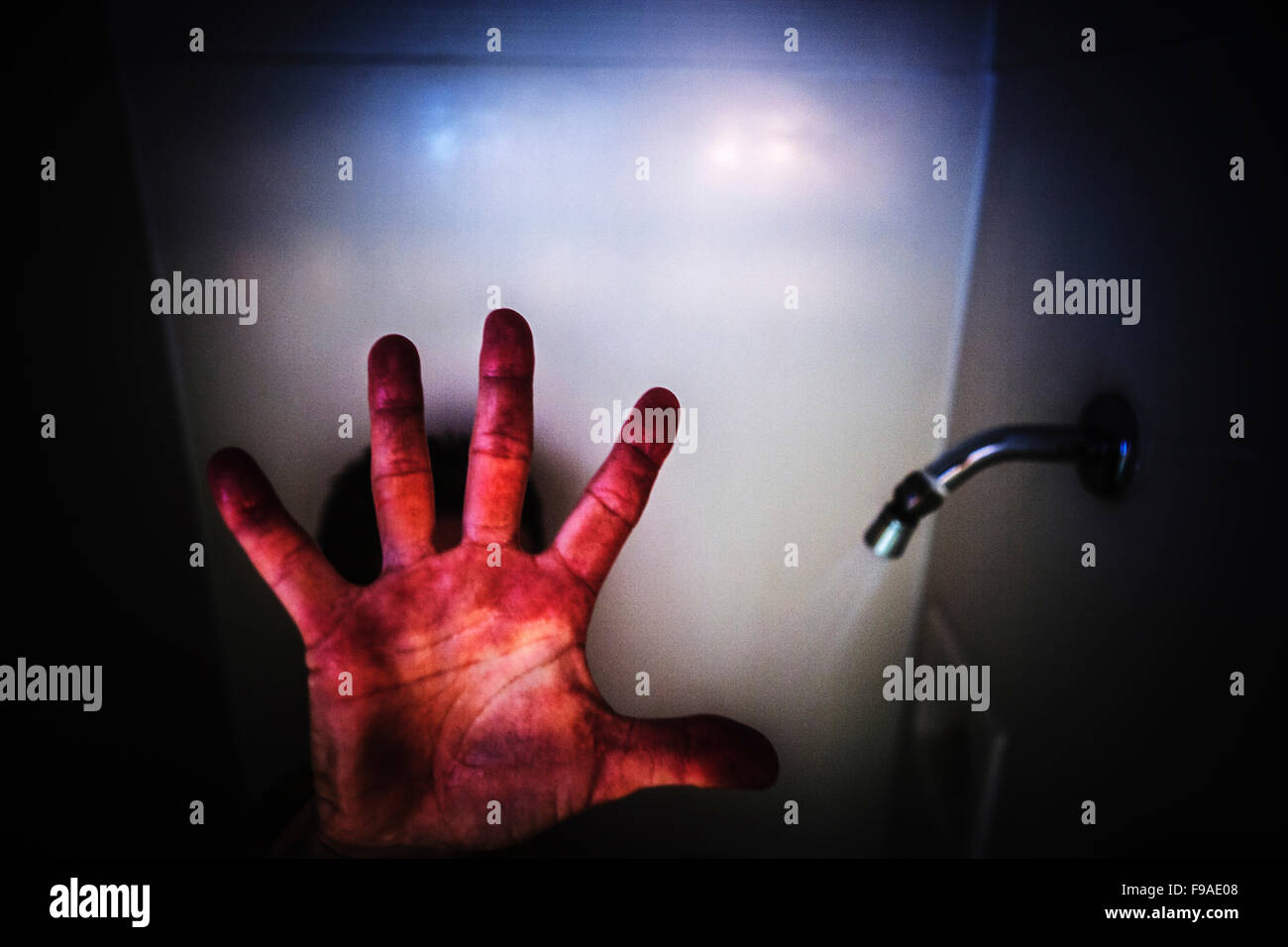 A woman's raised red hand Stock Photo - Alamy