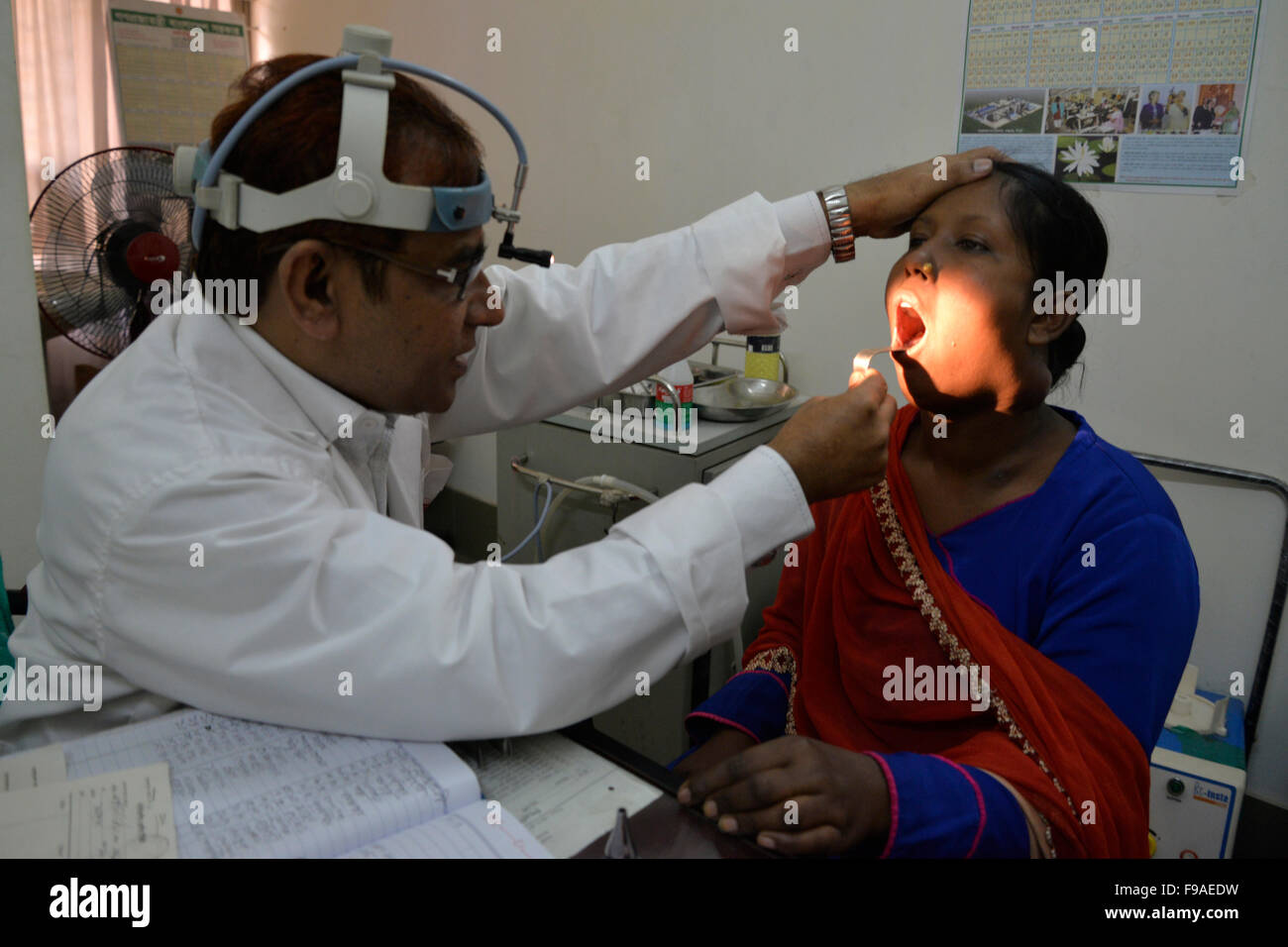 Dhaka, Bangladesh. 15th Dec, 2015. A Bangladeshi woman patient receives