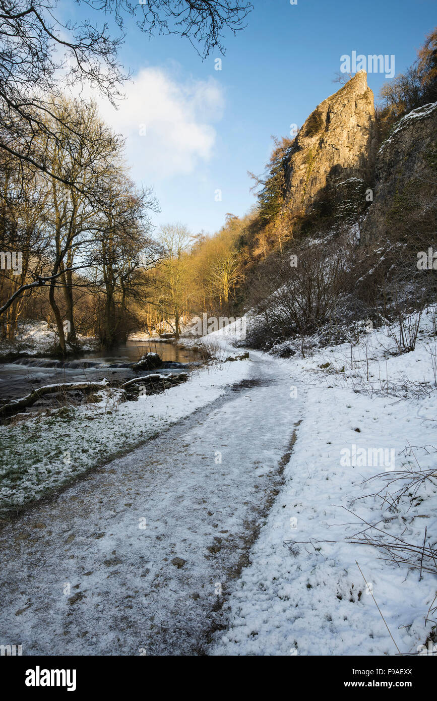 River flowing through snow covered Winter landscape in valley Stock ...