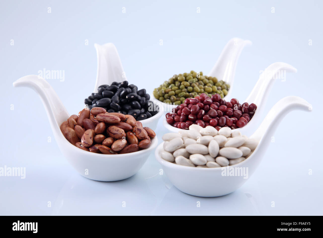 organic five soup beans in saucers Stock Photo