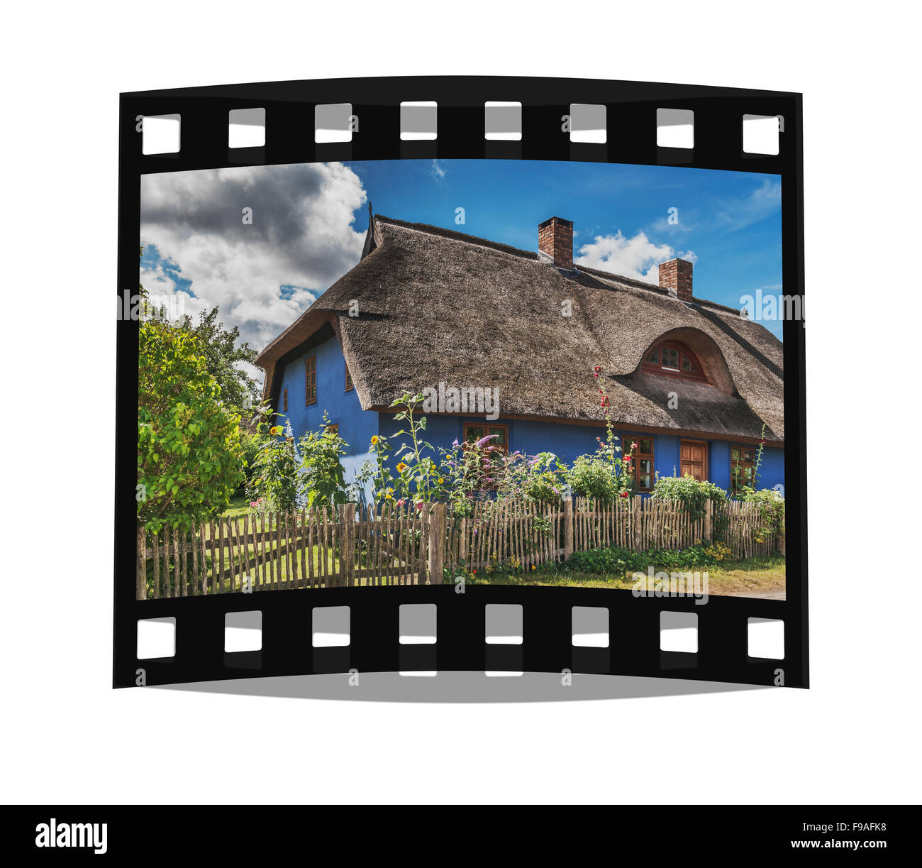 Blue house with thatched roof in Warthe, Island of Usedom, Mecklenburg-Western Pomerania, Germany, Europe Stock Photo