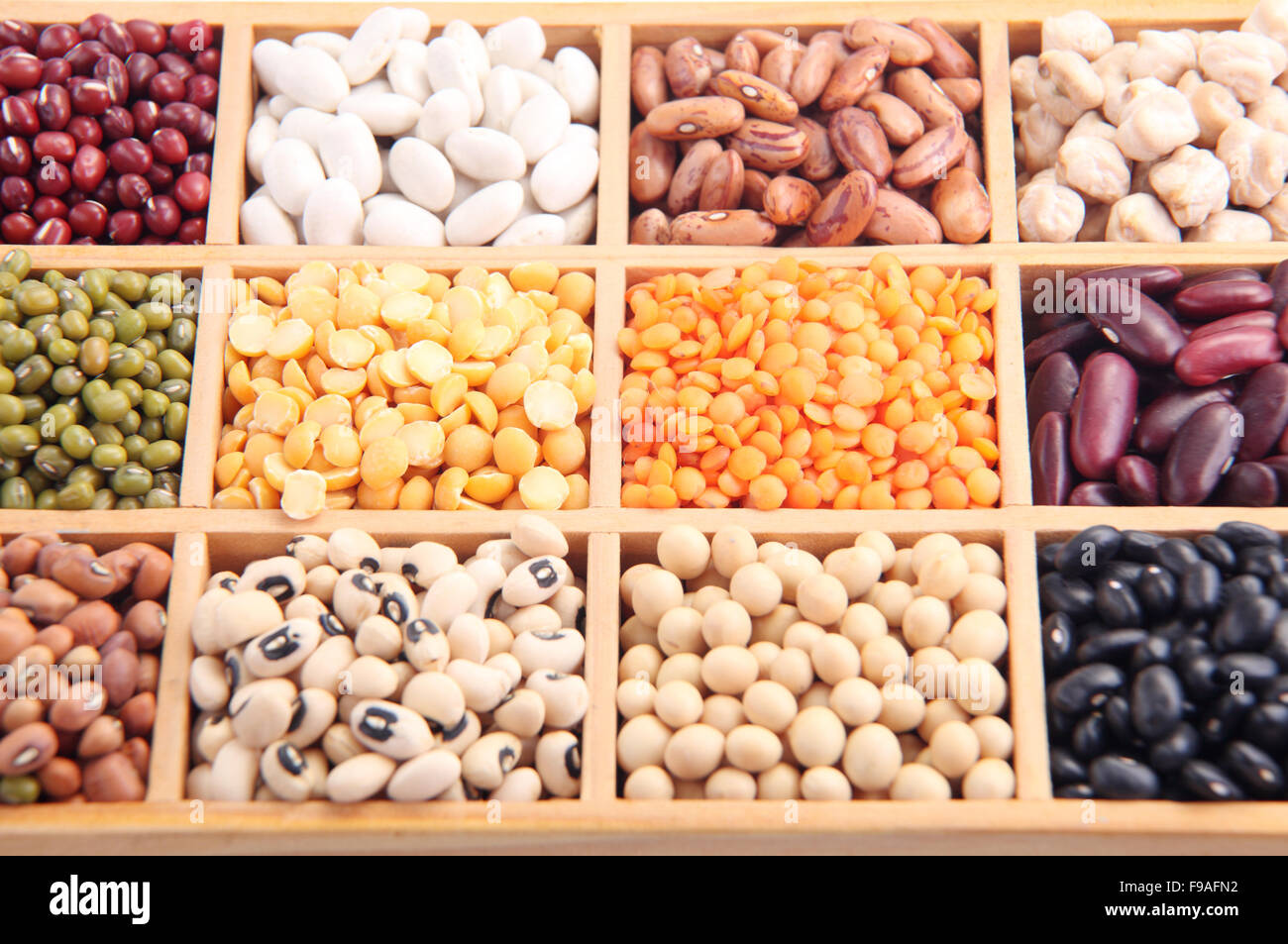 various beans contained in wood boxes Stock Photo Alamy