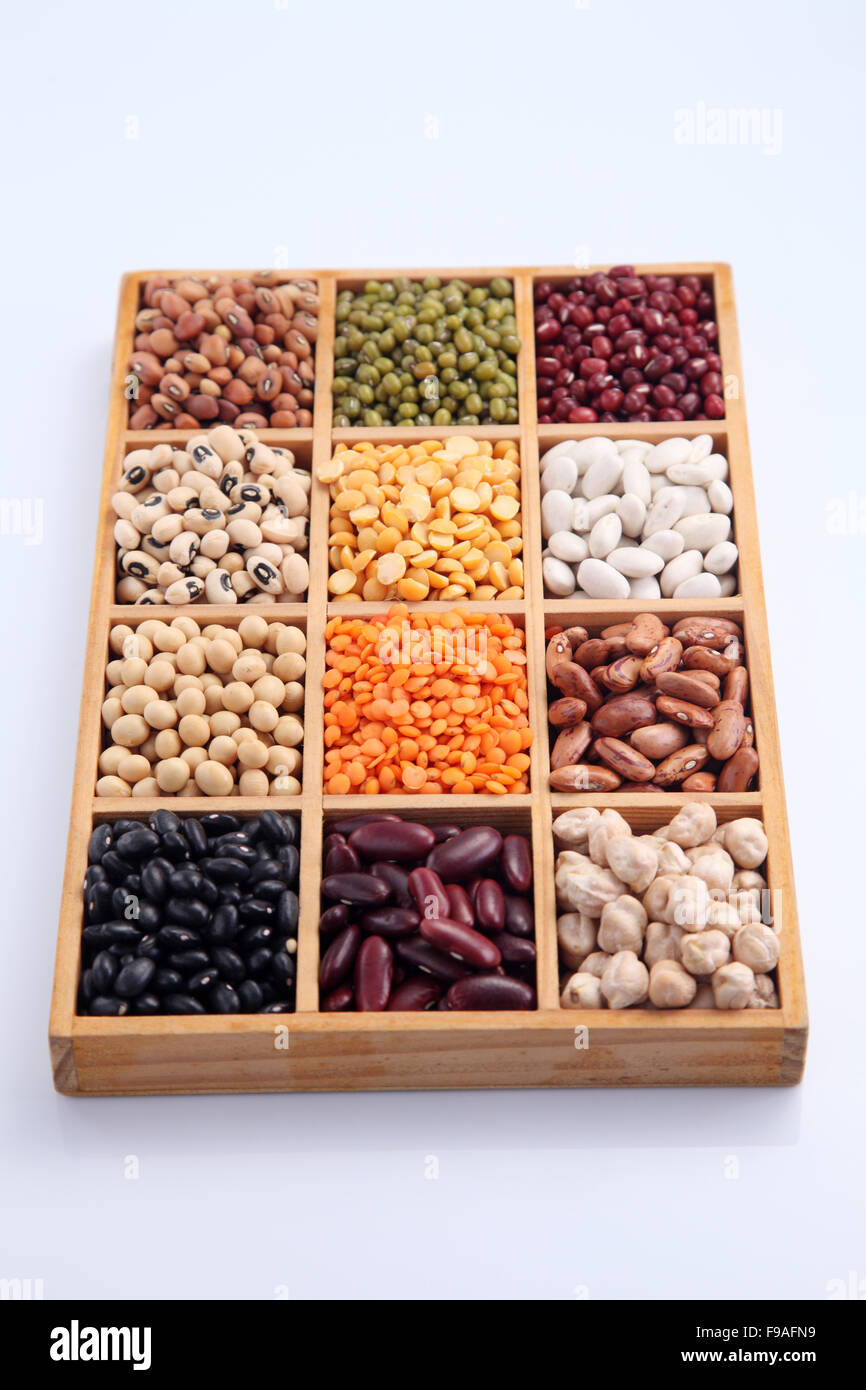 various beans contained in wood boxes Stock Photo Alamy