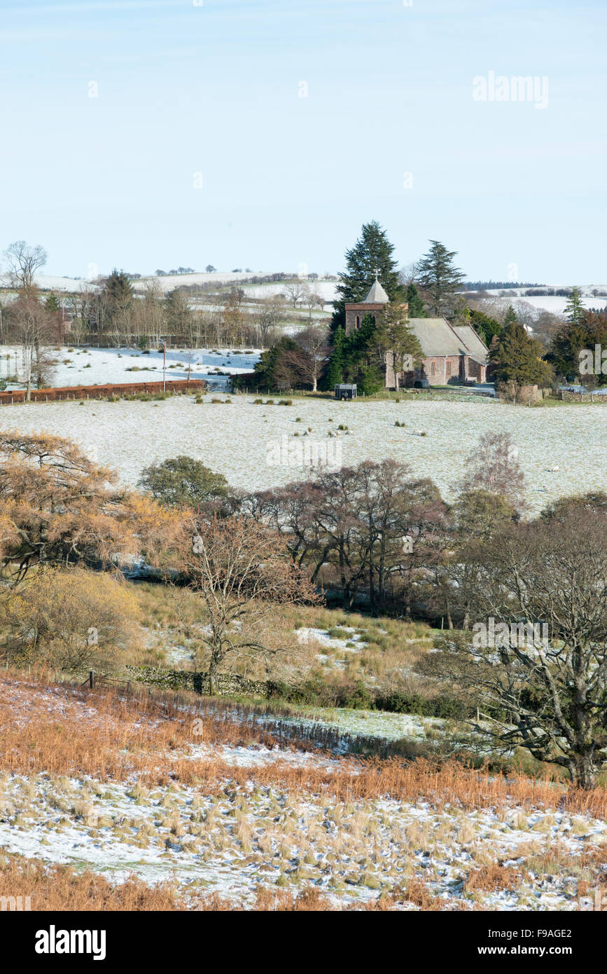 Watermill Lock Watermillock church set in a snowy landscape in the Lake District in ...
