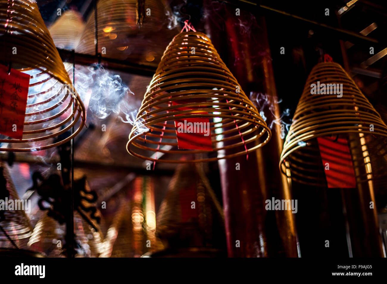 Burning incense coils Stock Photo Alamy