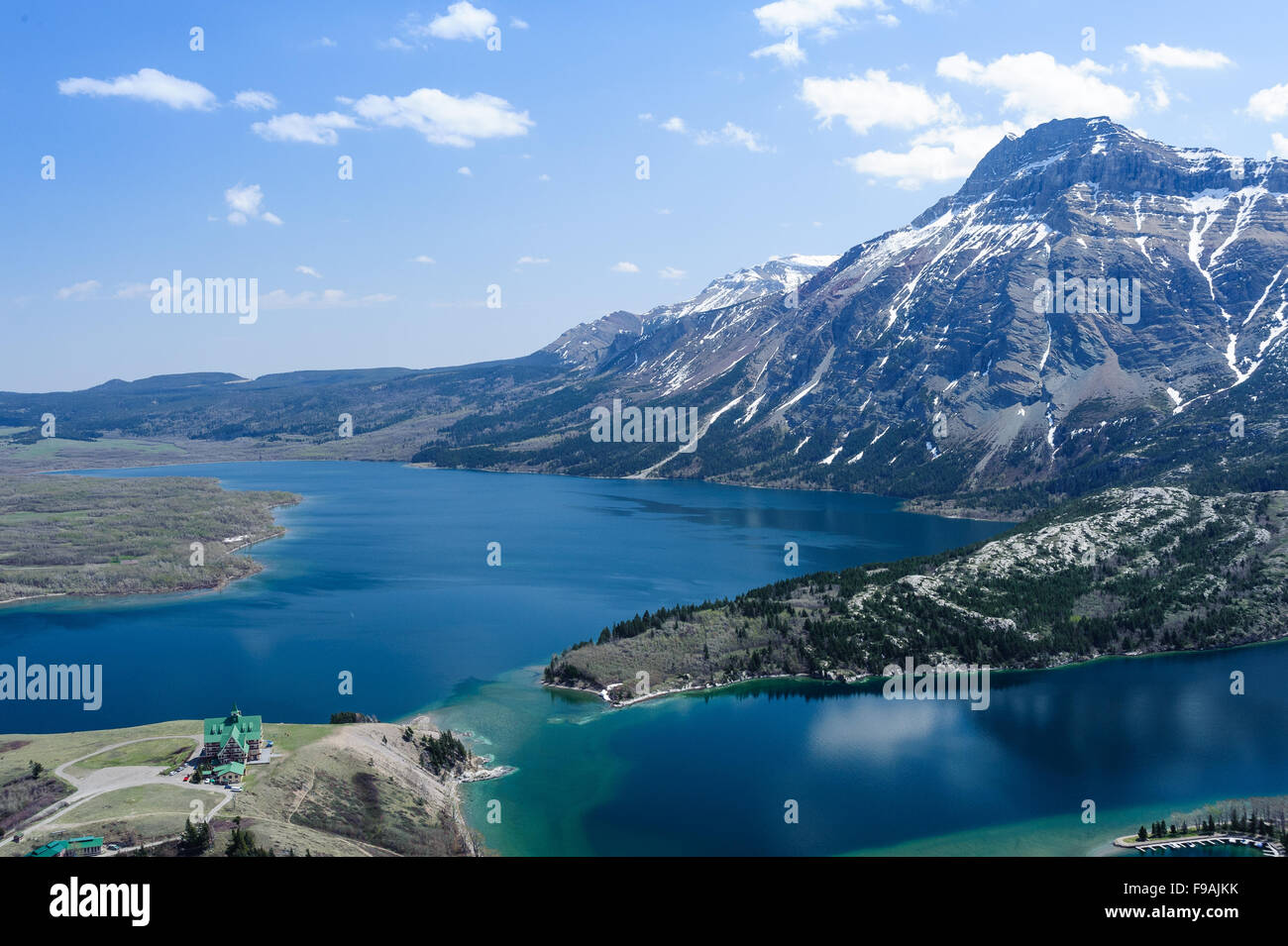 Waterton lake with aerial view of Prince of Wales Hotel in Waterton Lakes National Park, Alberta, Canada Stock Photo