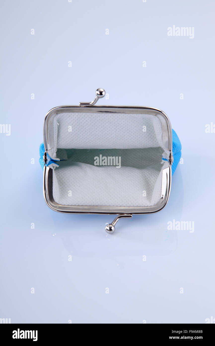 empty blue purse open on the white background Stock Photo - Alamy
