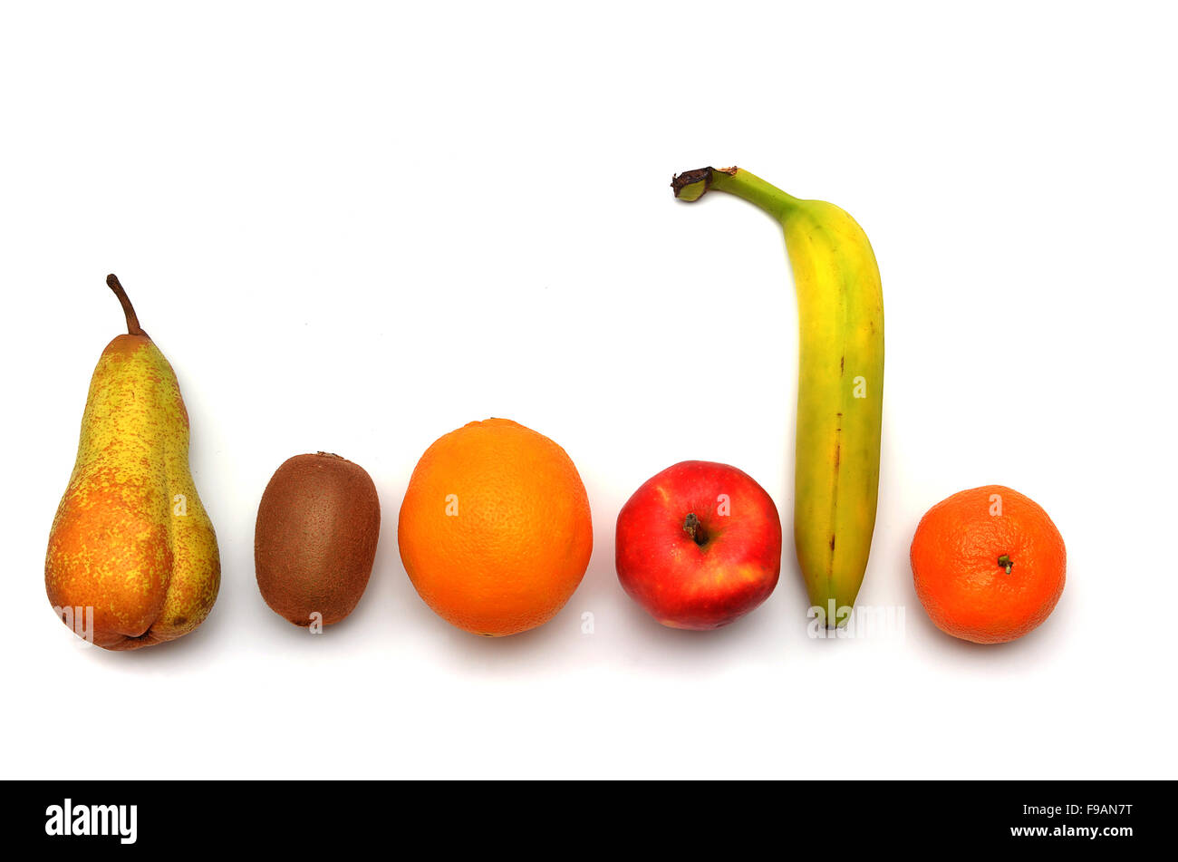 Various fruits, tangerine, apple, pear, banana, kiwi, orange Stock