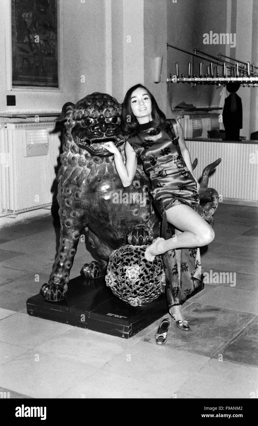 Woman posing near lion hi-res stock photography and images - Alamy