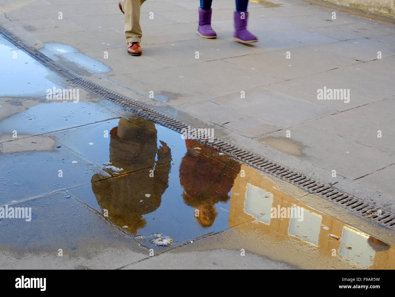 Street photography in London - reflection on the street Stock Photo