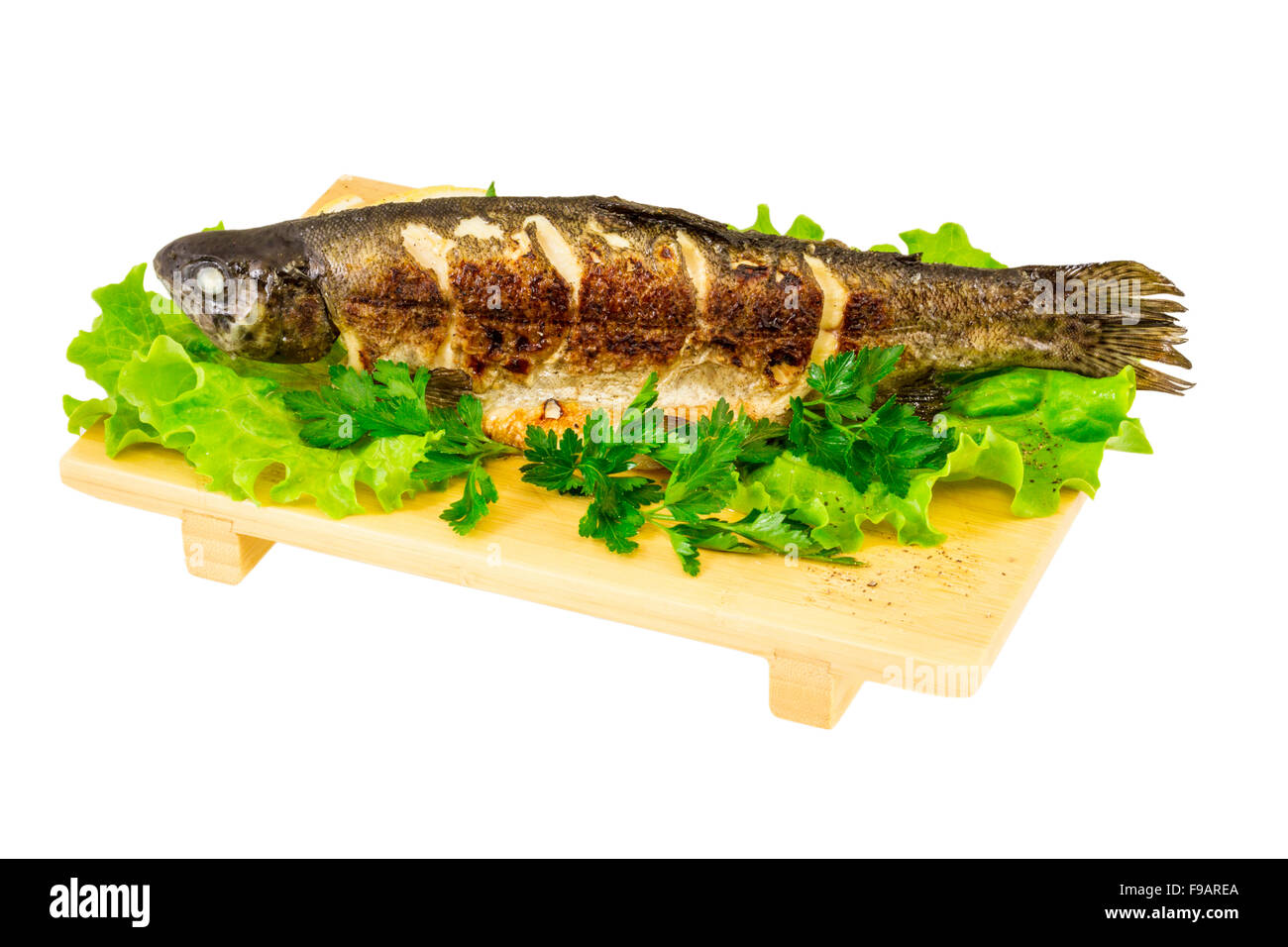Roasted striped sea bass Stock Photo Alamy