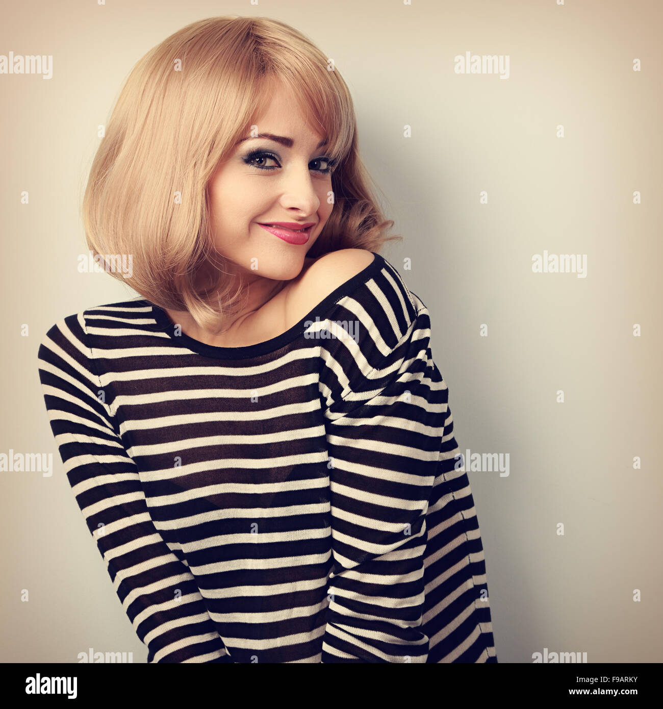 Beautiful Happy Blond Woman With Short Hair Style Posing And
