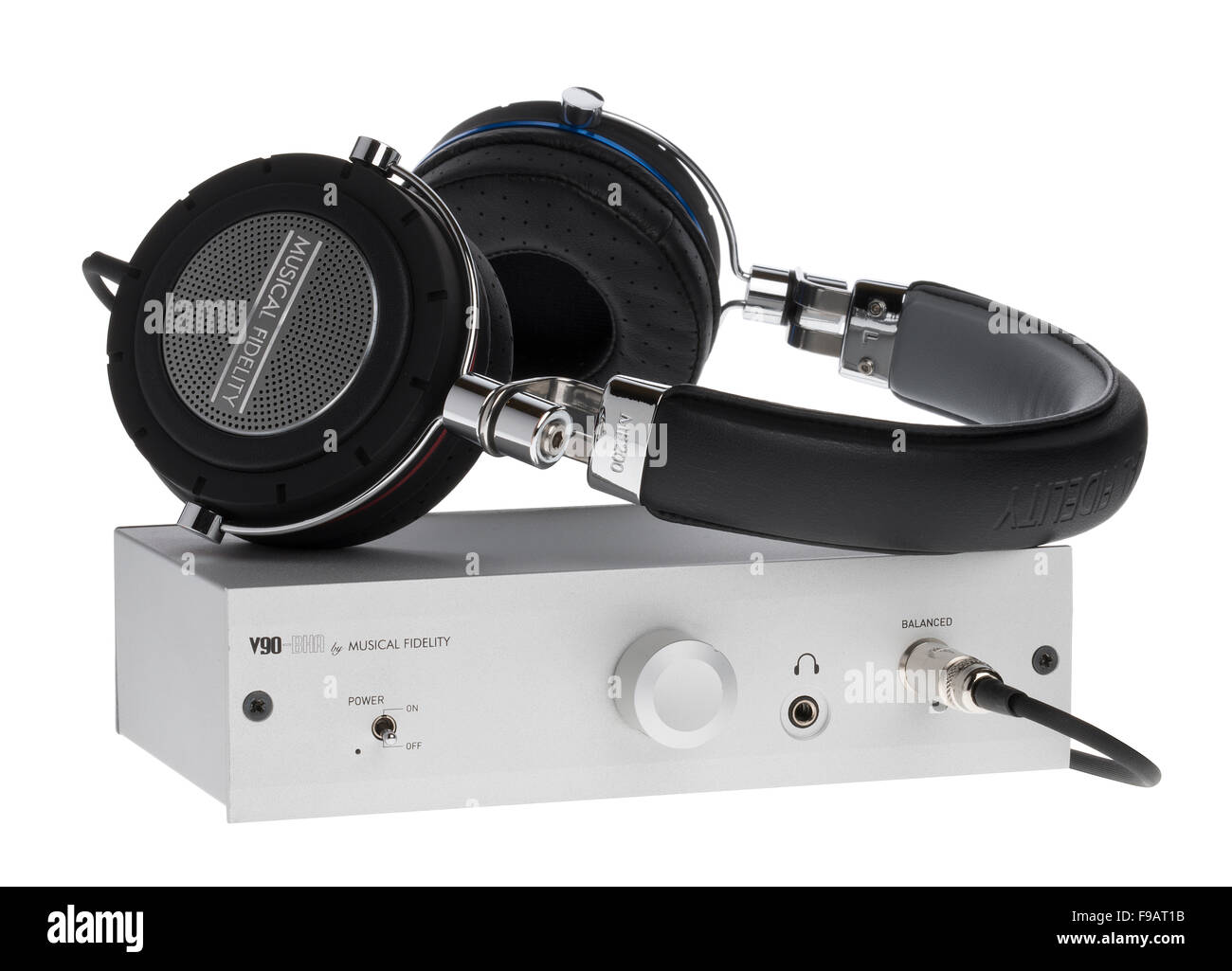 Musical Fidelity balanced audio headphone amplifier and headphones. Stock Photo