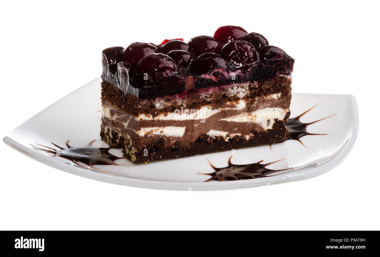 Chocolate cake with cherry on top on a white background Stock Photo - Alamy
