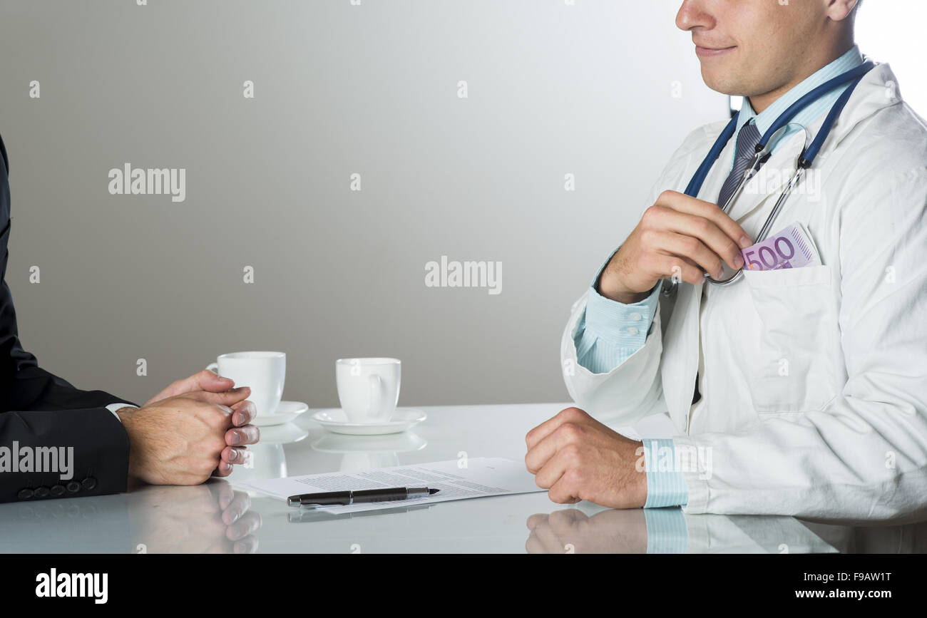 Closeup on medical doctor hands, taking money Stock Photo - Alamy