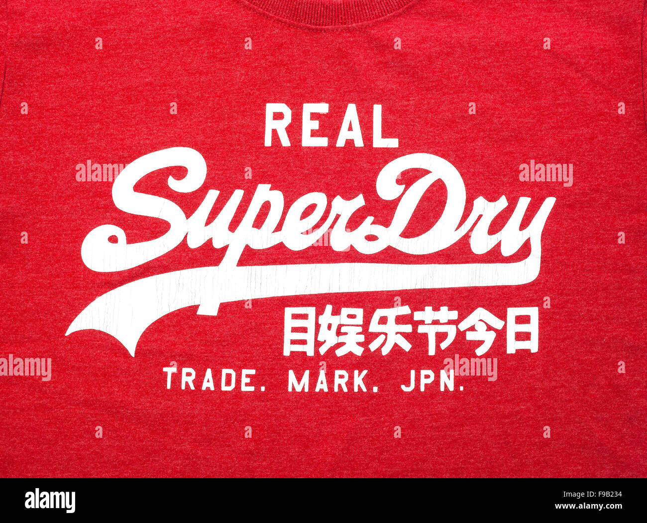 A Red Superdry Tee Shirt showing the Logo on a white background Stock Photo  - Alamy