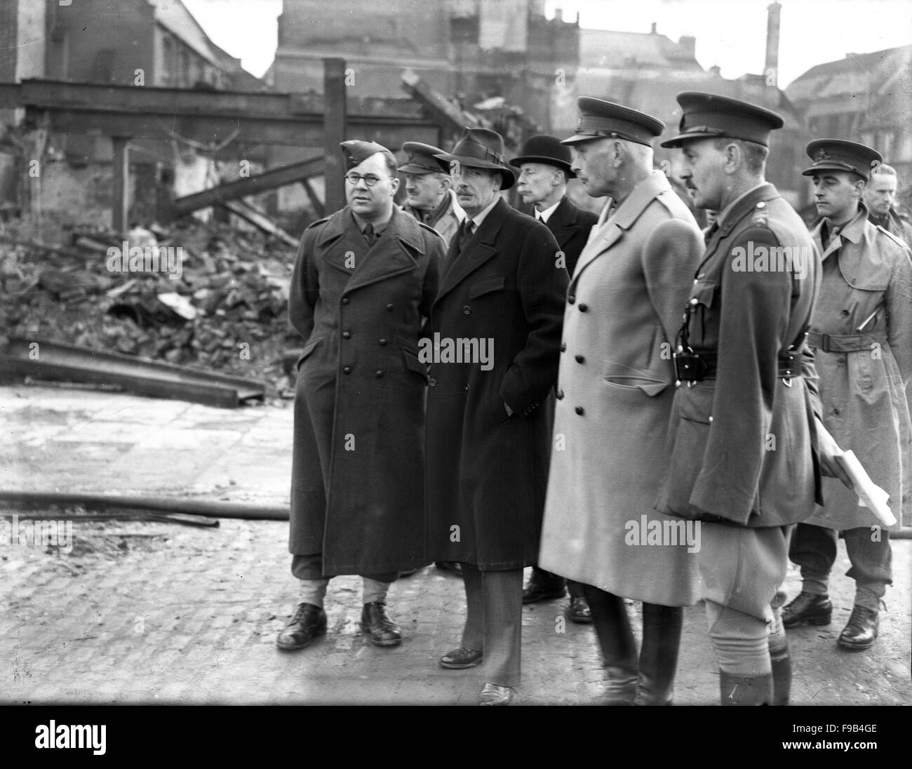 Anthony Eden looking at bomb damage in Coventry after the Blitz in 1940 Stock Photo