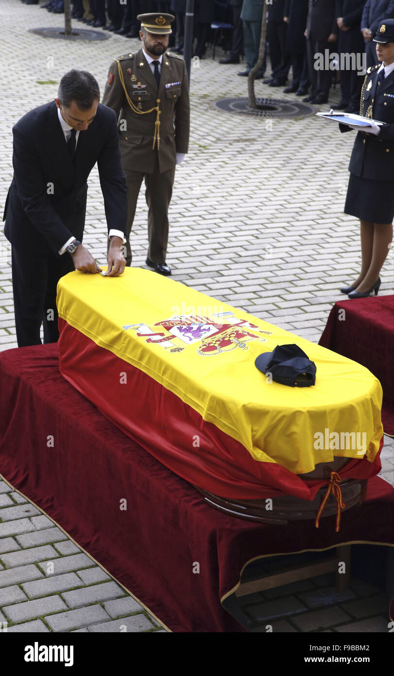 Madrid, Spain. 15th Dec, 2015. King Felipe VI of Spain, Queen Letizia of Spain attends a funeral ceremony at the Canillas police complex in Madrid on December 15, 2015 honouring the late policemen Jorge Garcia Tudela and Isidro Gabino San Martin Hernandez killed during a Taliban attack near Spain's embassy in Kabul three days ago. The Spanish government said Garcia Tudela and San Martin Hernandez as well as two local embassy workers were killed in the attack as Taliban fighters laid siege to a guesthouse popular with foreign visitors near the embassy compound. Afghan officials said four Afgha Stock Photo