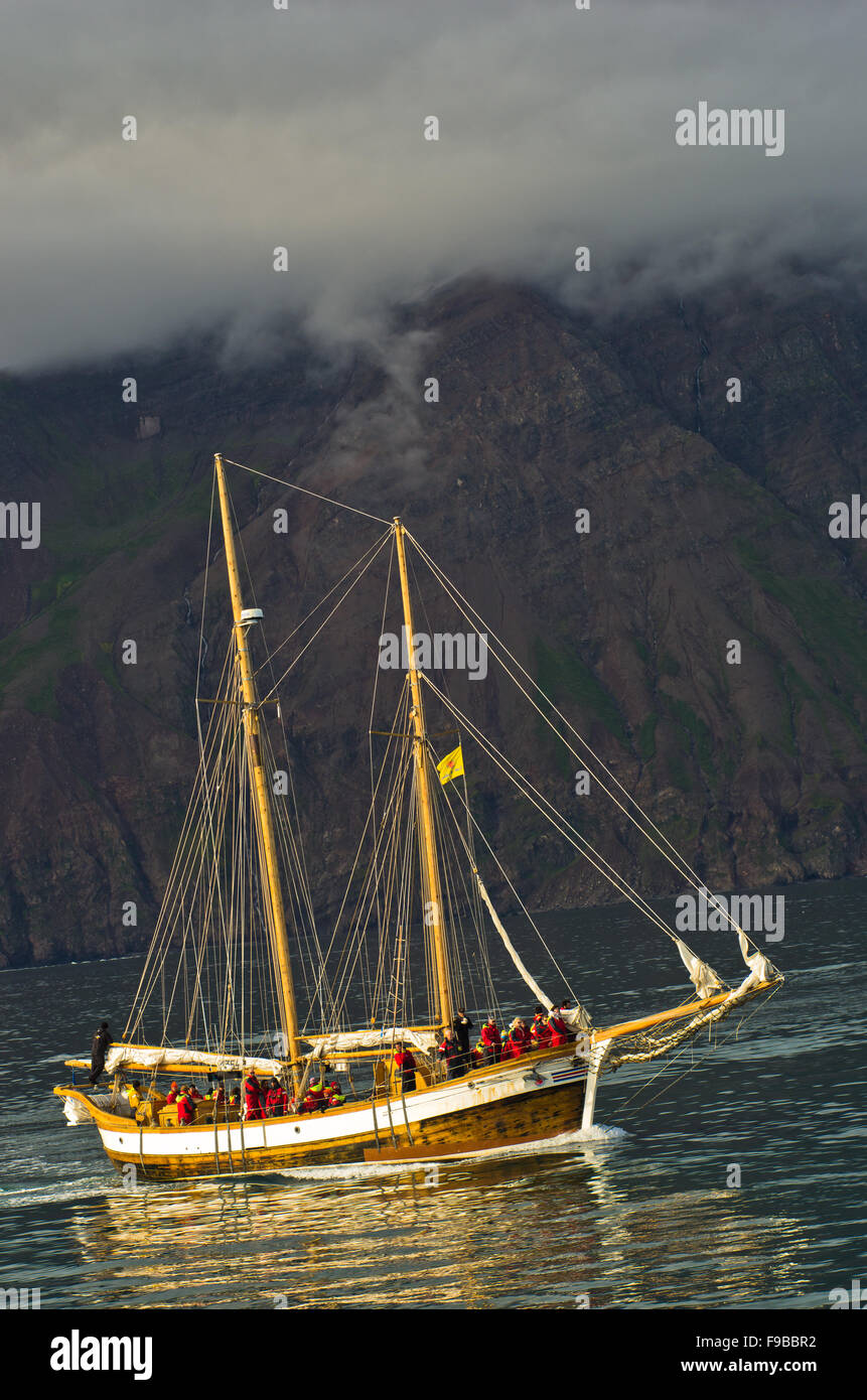 Whale watching tour from old sailing ship at Husavik bay area Stock ...