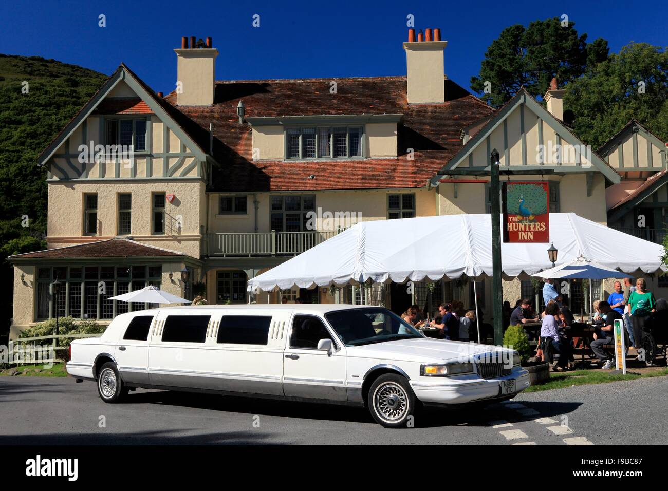 Stretch limousine outside The Hunters Inn, Exmoor National Park, North Devon Stock Photo