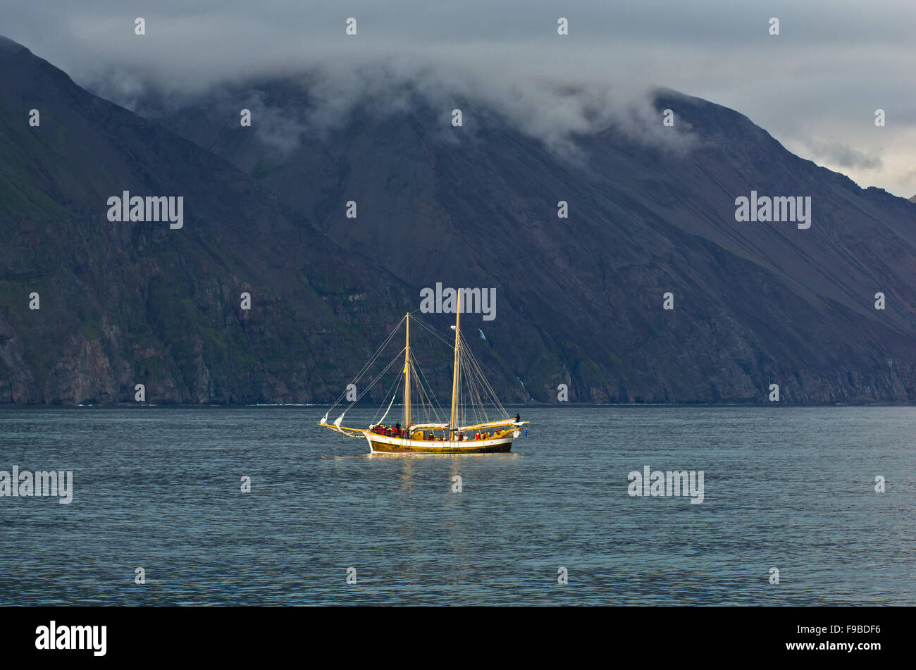 Whale watching tours from old sailing ship at Husavik bay area Stock ...