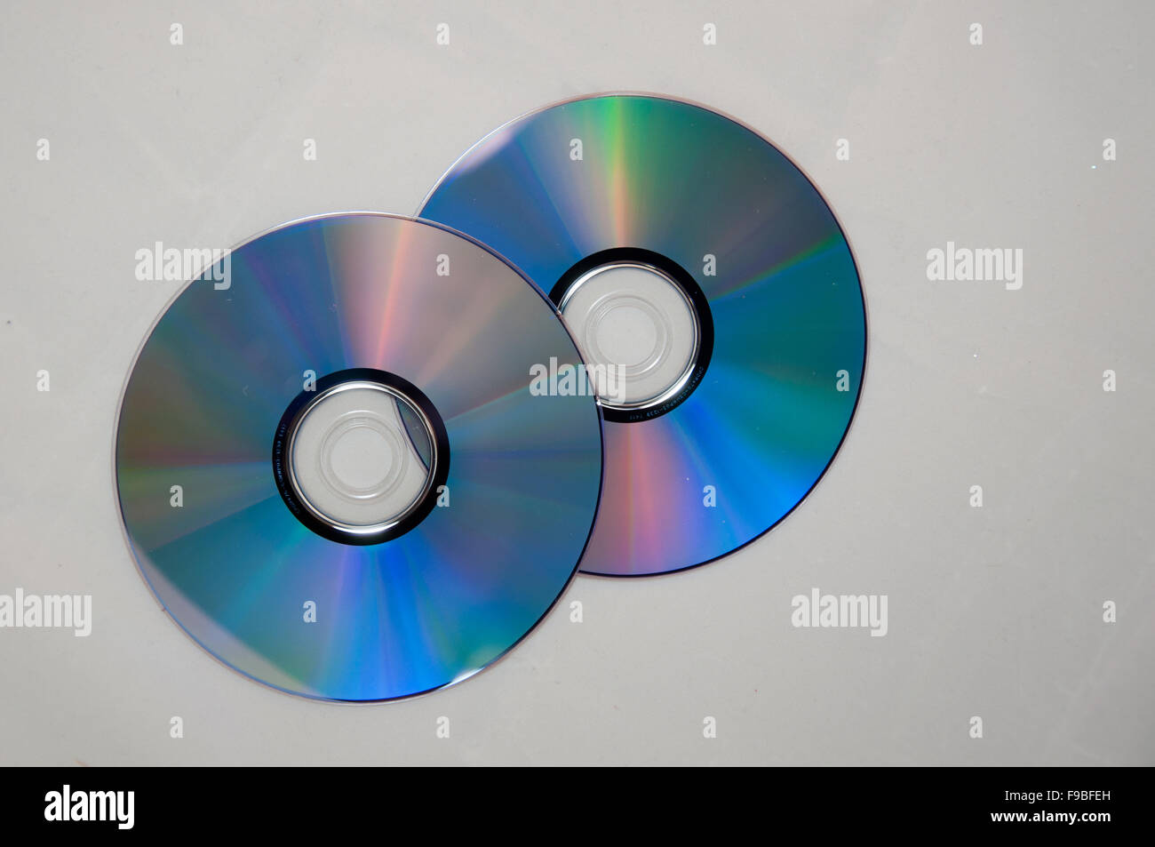 Two music compact discs or cd dvd vcd blueray Stock Photo