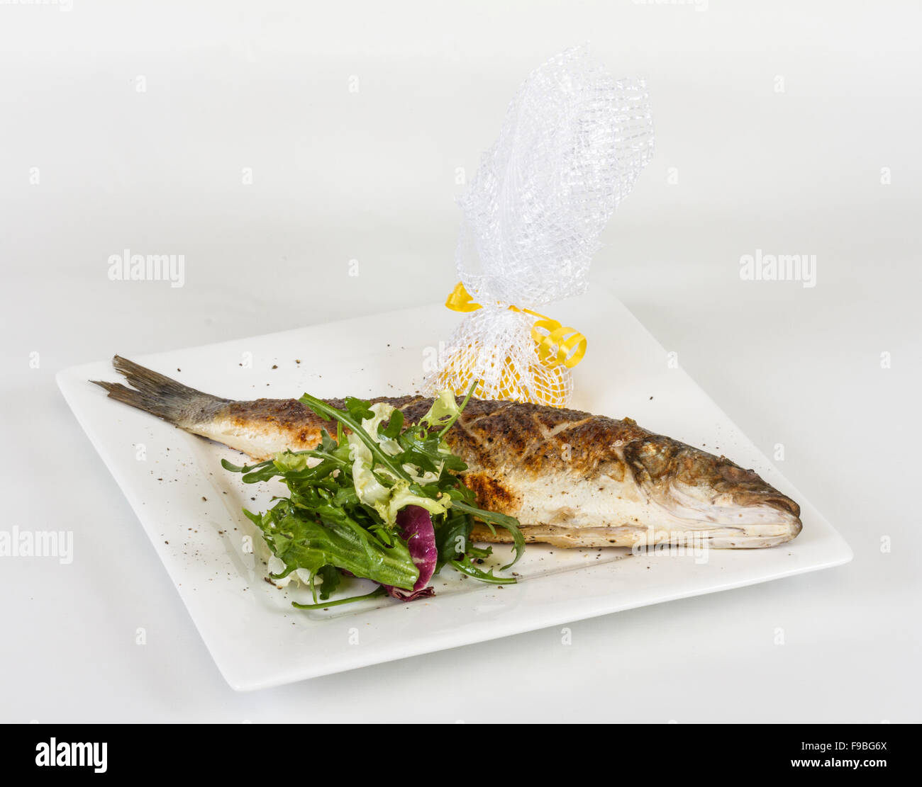 Seabass with vegetables Stock Photo Alamy