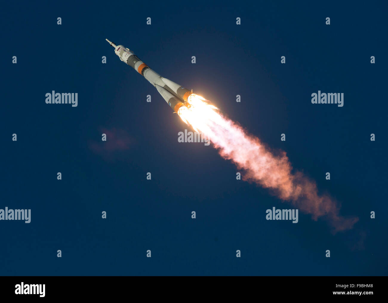 The Soyuz TMA-19M rocket is launched with Expedition 46 Soyuz Commander Yuri Malenchenko of the Russian Federal Space Agency (Roscosmos), Flight Engineer Tim Kopra of NASA, and Flight Engineer Tim Peake of ESA (European Space Agency), Tuesday, Dec. 15, 2015 at the Baikonur Cosmodrome in Kazakhstan.  Malenchenko, Kopra, and Peake will spend the next six-months living and working aboard the International Space Station.  Photo Credit: (NASA/Joel Kowsky) Stock Photo