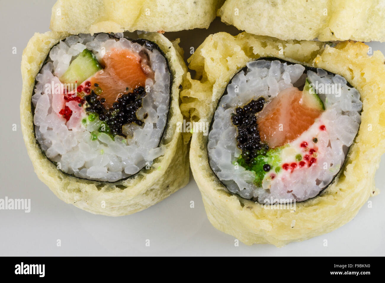 Japanese Cuisine Tempura Maki Sushi (Deep Fried Roll made of salmon, tobiko roe and Cream