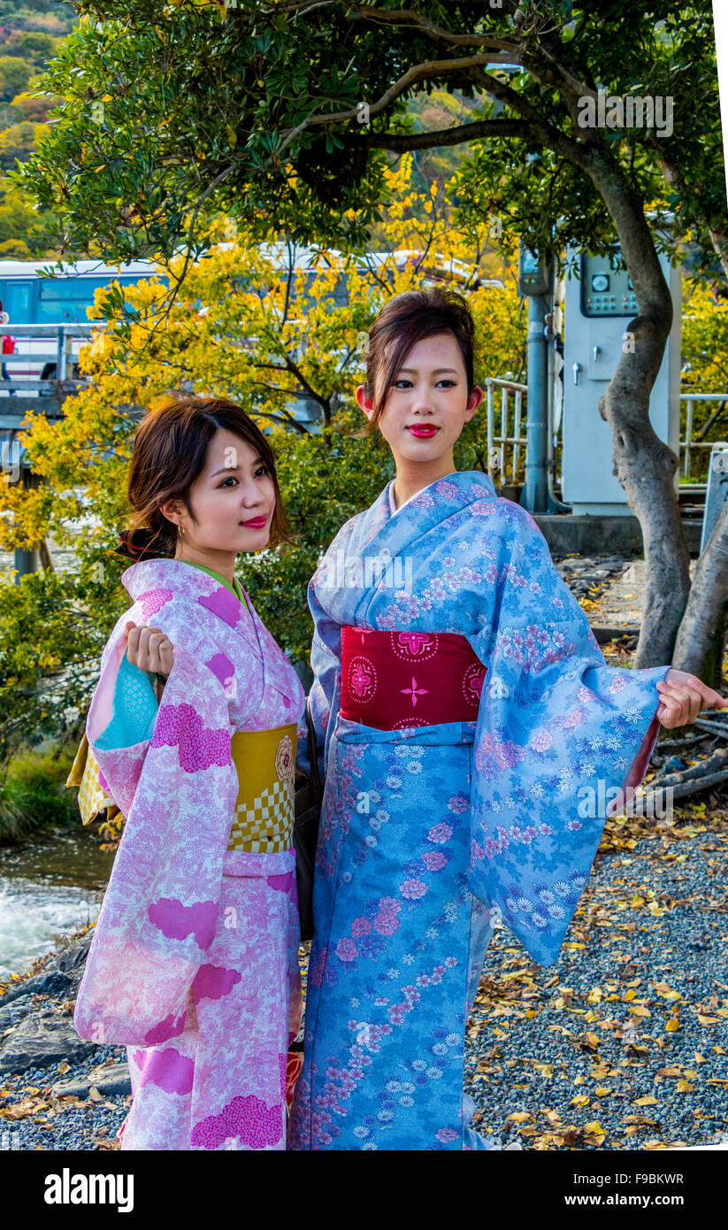 Ladies in traditional Kimono walking round streets and temple at Tenryu