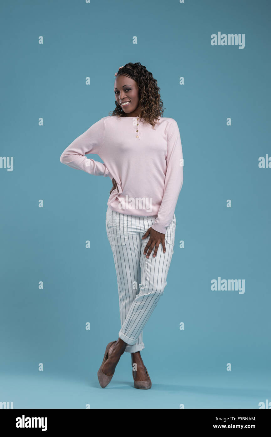 Portrait of cute african woman posing - full length smiling portrait ...