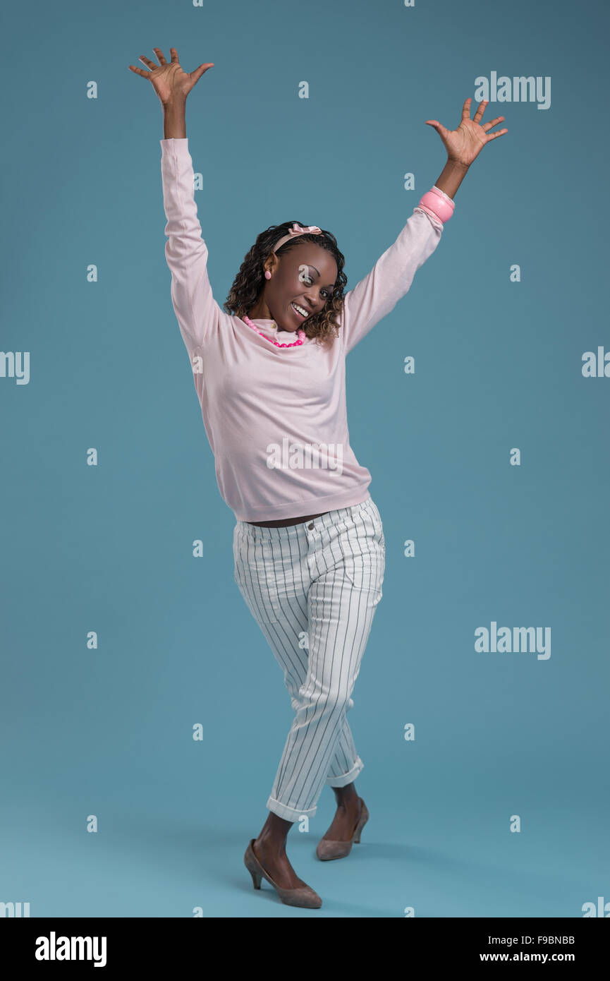Young woman cute dancing pose hi-res stock photography and images - Alamy