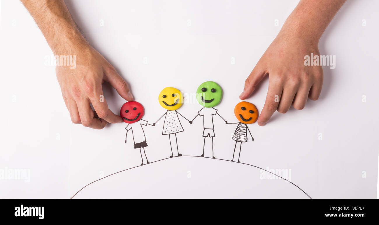 Happy family concept with heads from play dough Stock Photo