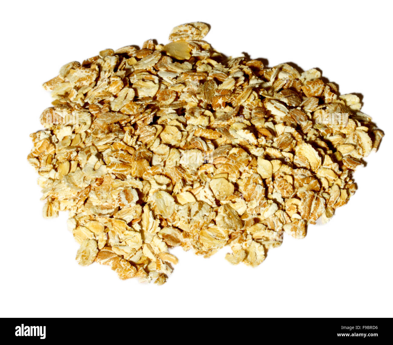 Heap of dry rolled oats isolated on white background Stock Photo Alamy