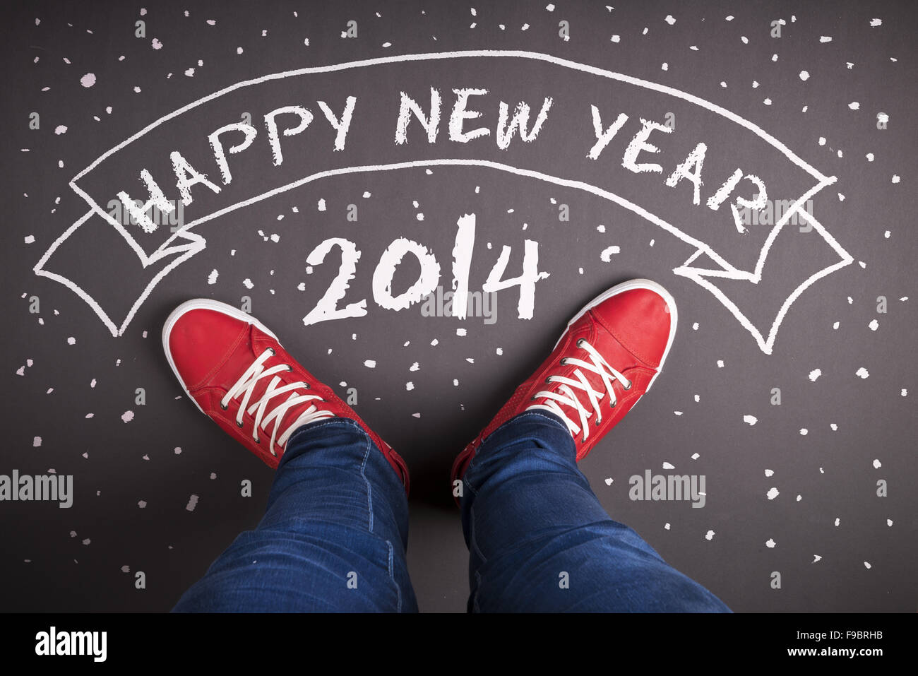 New year concept with red shoes and white chalk Stock Photo