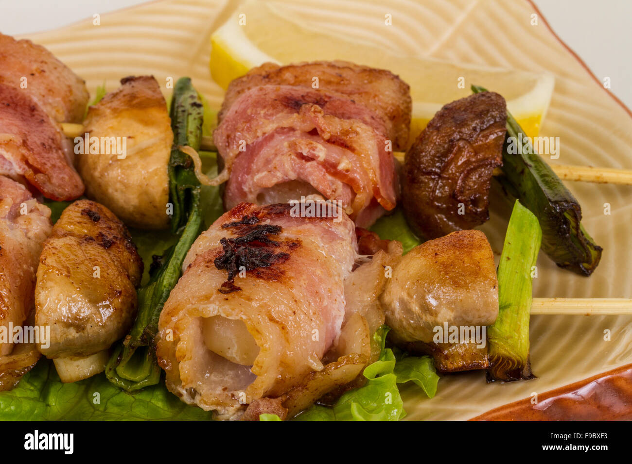 Bacon wrapped grilled Scallops with mushrooms and bacon Stock Photo Alamy
