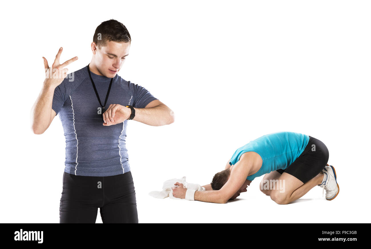 Professional fitness coach is training himself, isolated on whithe background. Stock Photo