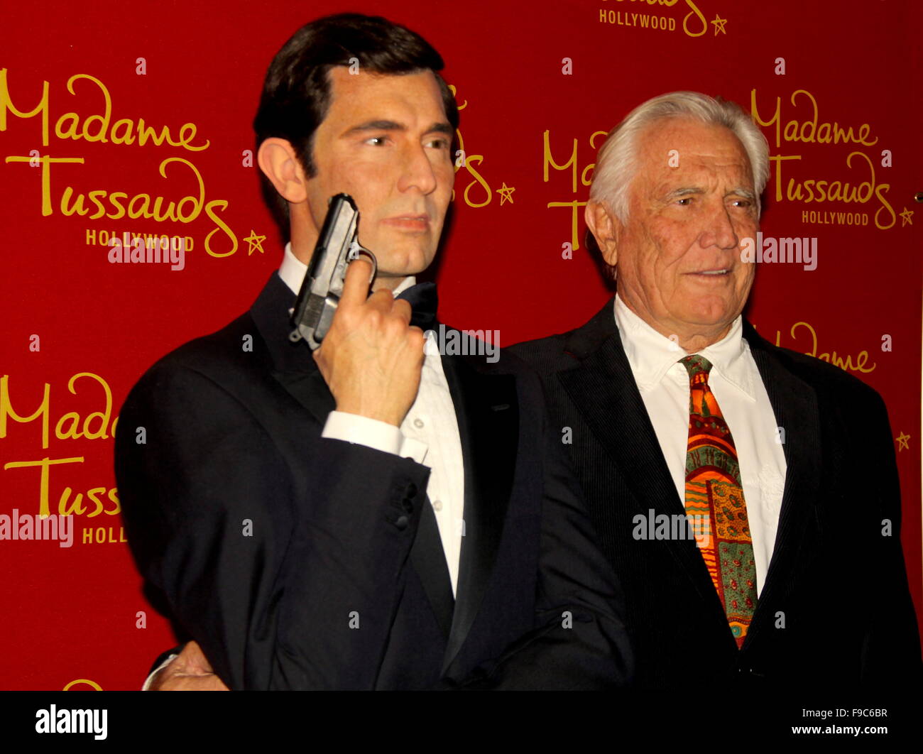 Hollywood, California, USA. 14th Dec, 2015. I15797CHW.Madame Tussauds Hollywood Reveal All Six James Bonds In Wax With Special Guest George Lazenby Madame Tussauds-Hollywood, Hollywood, CA.12152015.GEORGE LAZENBY POSING WITH A WAX FIGURE OF HIS JAMES BOND CHARACTER .©Clinton H. WallacePhotomundo International Photos Inc © Clinton WallaceGlobe Photos/ZUMA Wire/Alamy Live News Stock Photo
