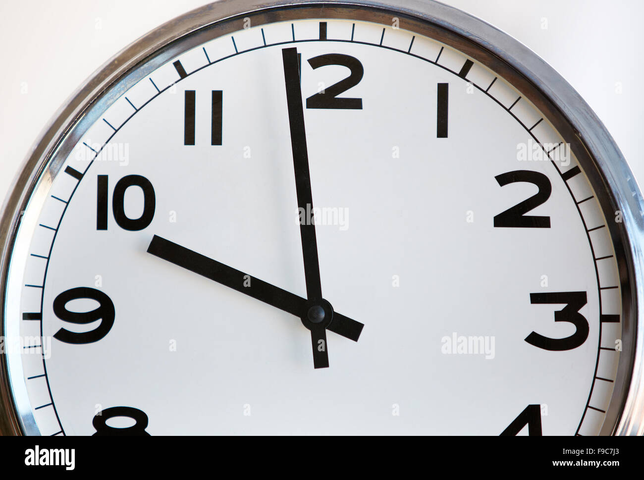 Round clock shows ten o’clock Stock Photo Alamy