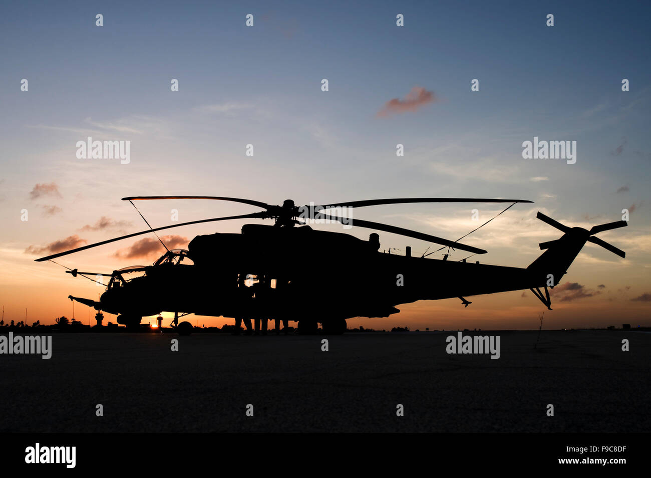 An AH-2 Sabre (Mi-35M) at sunset in Natal, Brazil, during exercise Cruzex 2013. Stock Photo