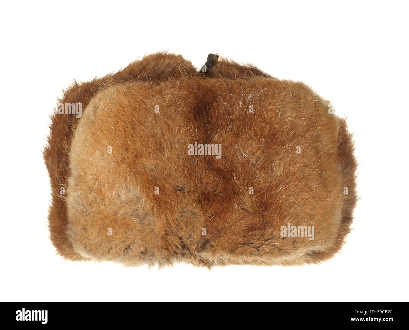 Winter fur hat brown isolated on white background. Stock Photo