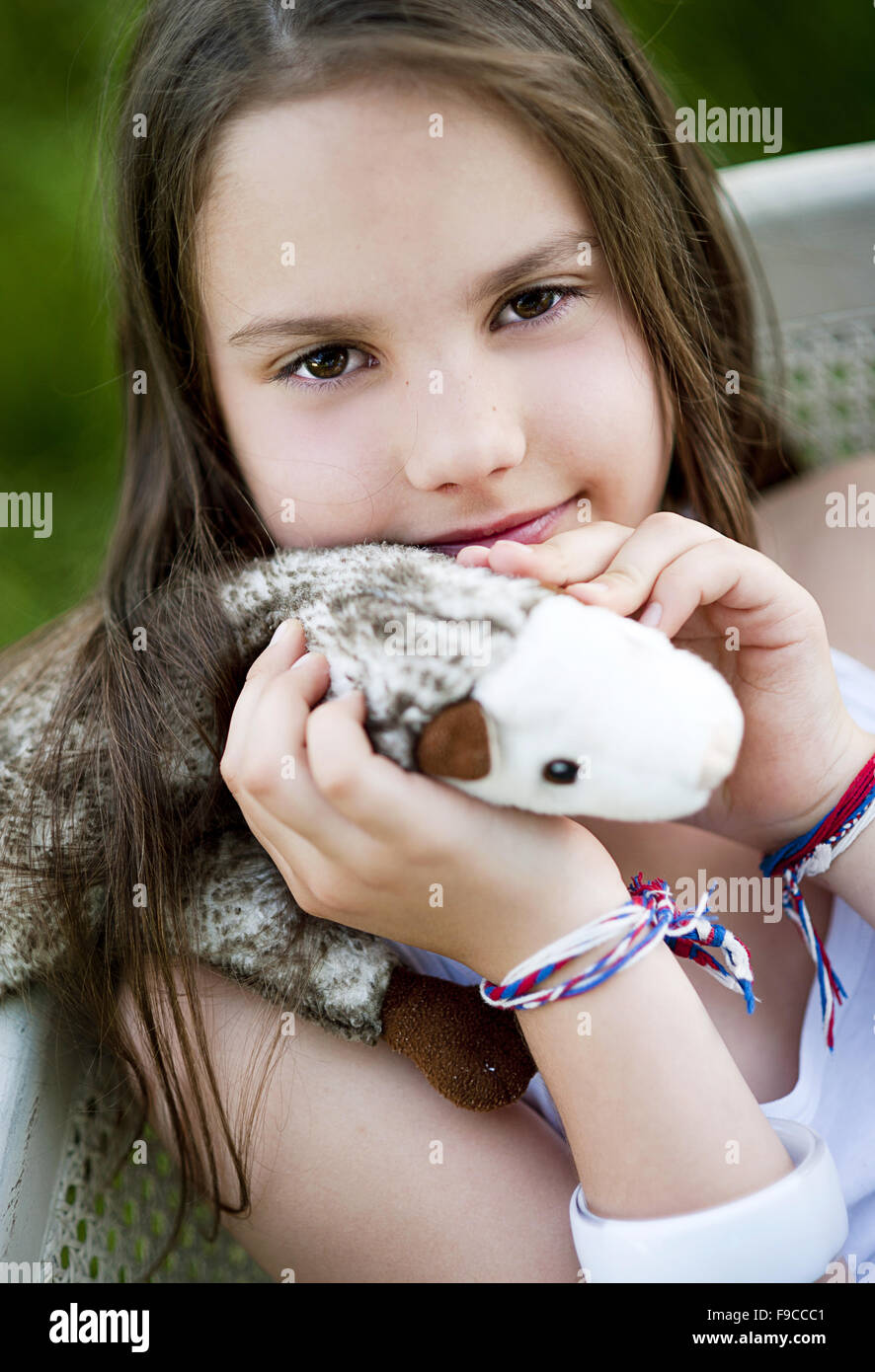 Cute little girl is playing outside in the country Stock Photo - Alamy