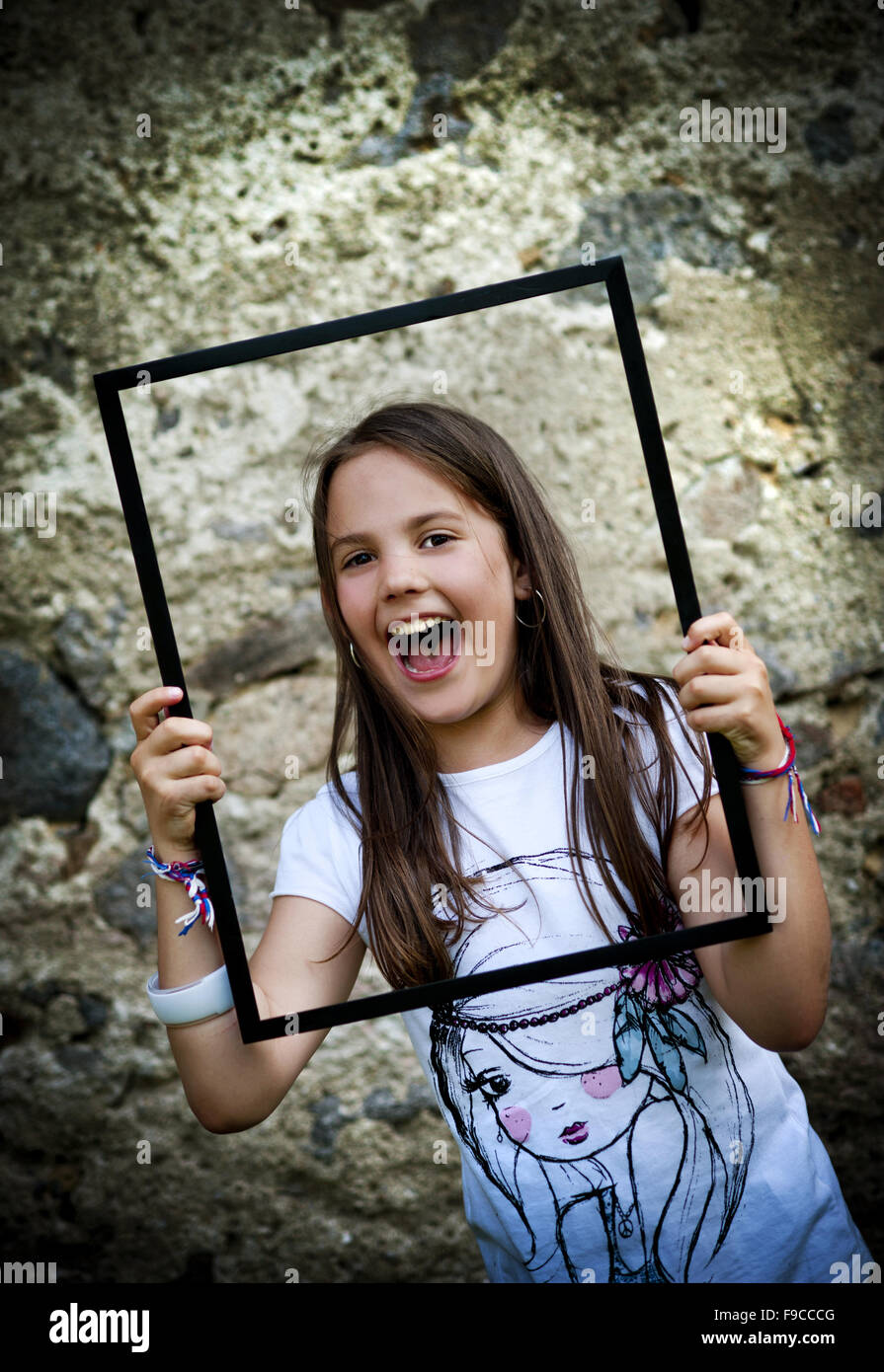 Cute little girl is playing outside in the country Stock Photo - Alamy